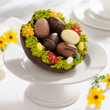 Produktbild fr 'Dekoratives Baumkuchen-Osternest mit feinsten Pralineneiern'