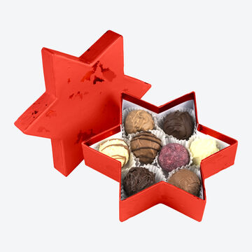 Produktbild fr 'Exquisite handgefertigte Trffelpralinen in weihnachtlicher Sternschachtel'