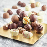 Produktbild fr 'Exquisite Trffelpralinen in edler Holzschachtel'